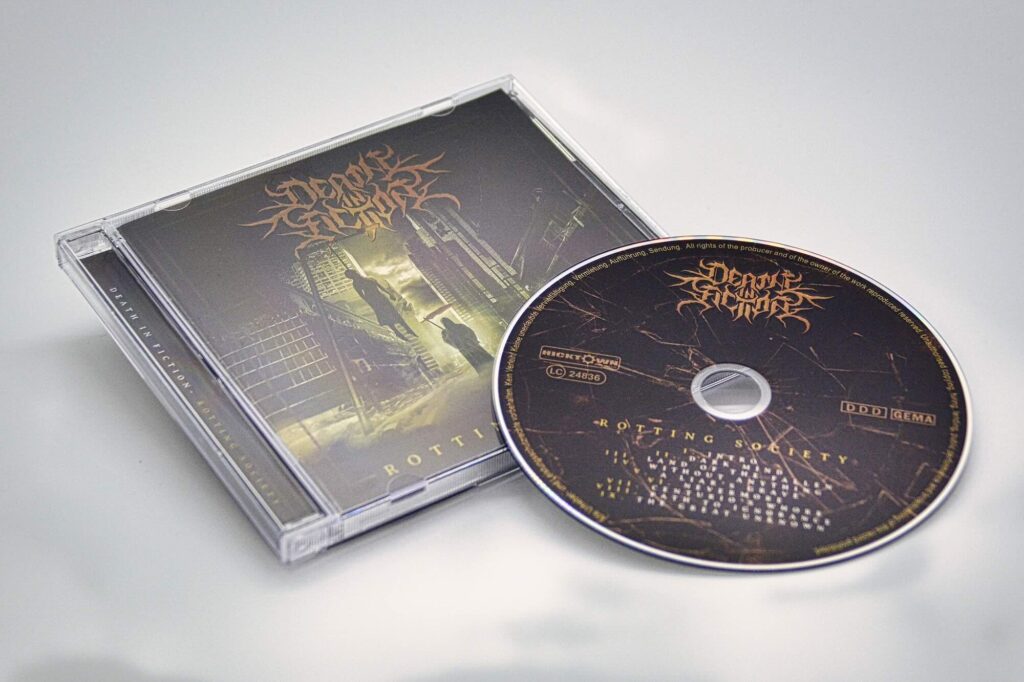Death In Fiction - Rotting Society (Album, Symbolbild), CD, Grüne Apokalyptische Stadt, in Grün & Sensenmann, Ausgestorben